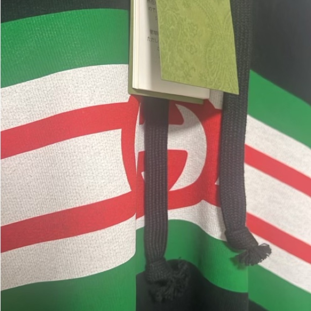 Brand new black Gucci sweater, timeless design and style.
